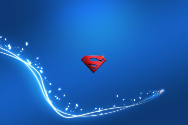 Czerwone logo Supermana na niebieskim tle z białą falą