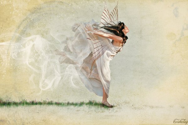A girl runs in a white dress and with wings on her back