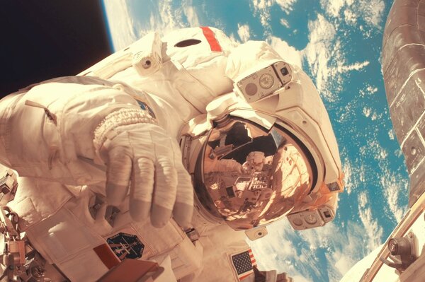 An astronaut in a state of weightlessness in outer space