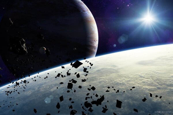 Asteroidi sullo sfondo del pianeta e del sole
