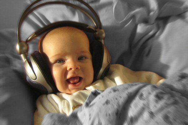 A small child wearing headphones