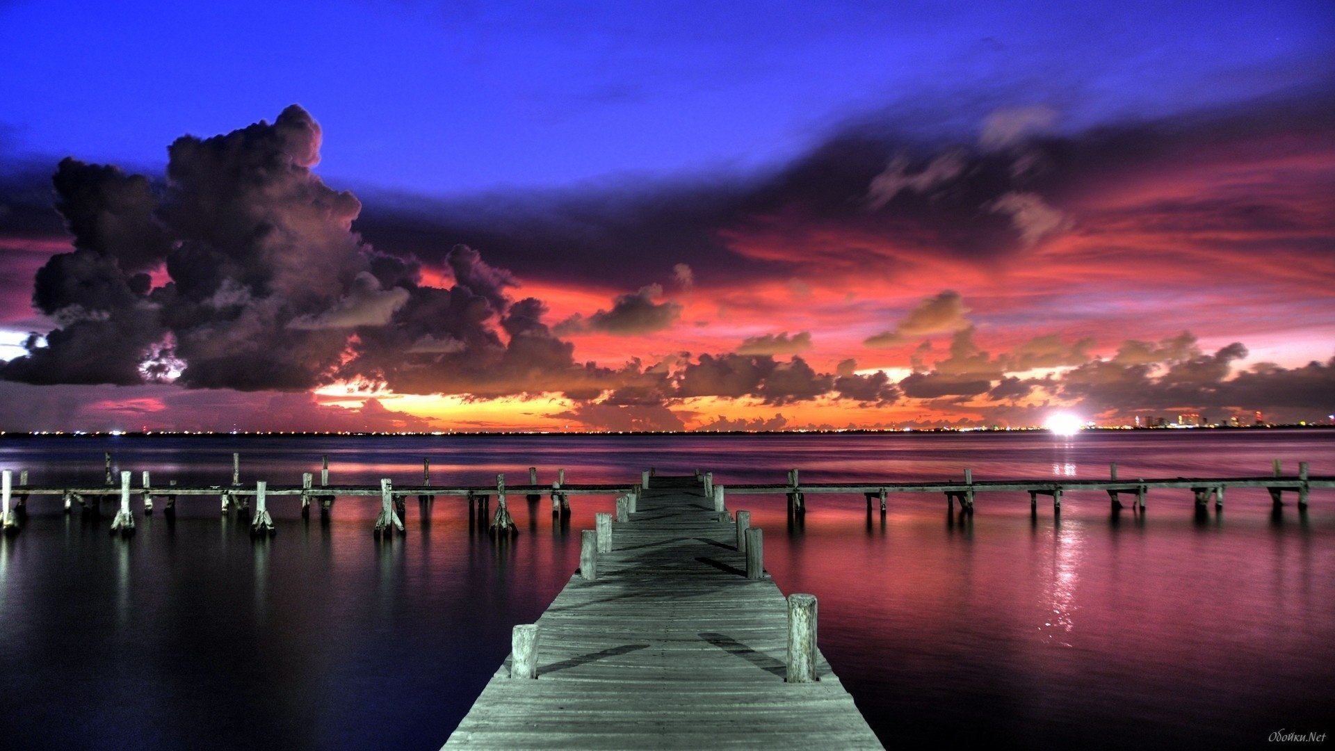 mare molo ponte di legno cielo tramonto