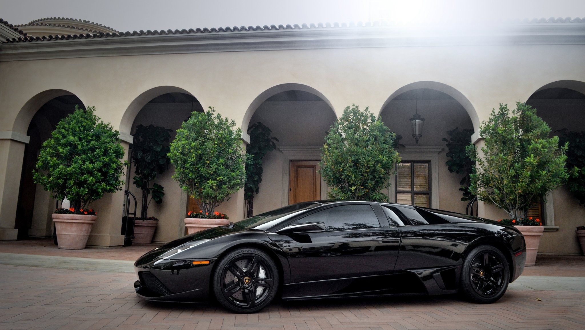 lamborghini murcielago lp640 black lamborghini murcielago side view building facade column