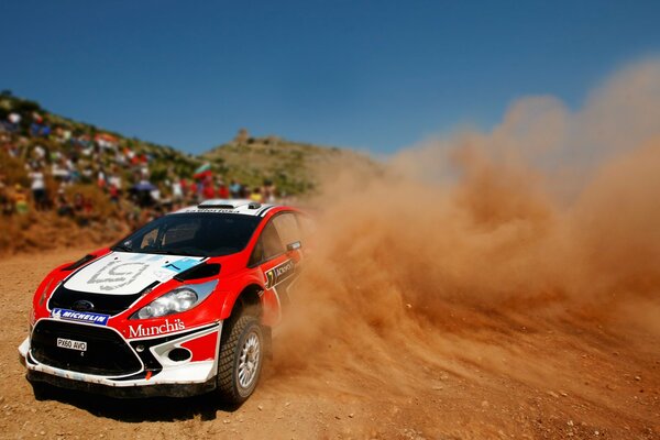 Ford fiesta car during a dusty skid