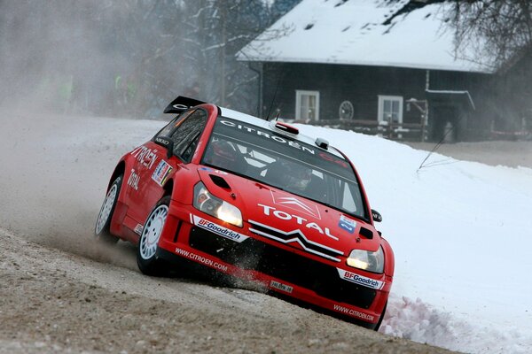 Winter off-road racing in a red car