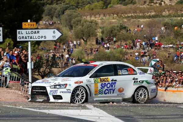 Mitsubishi racing car on the turn