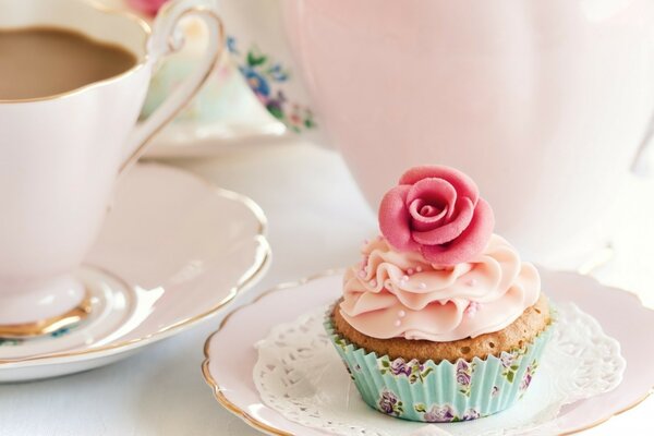 Delicate dessert with a rose of cream for coffee