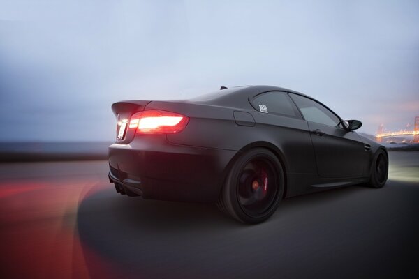 Bmw, m3 E92 matte black, speed on the road, rear view
