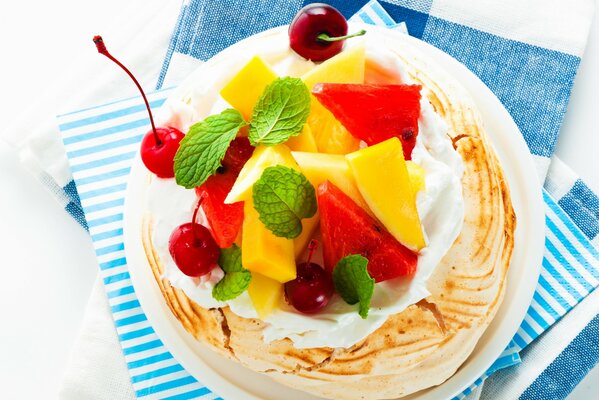 Dessert with slices of fruit on a white background