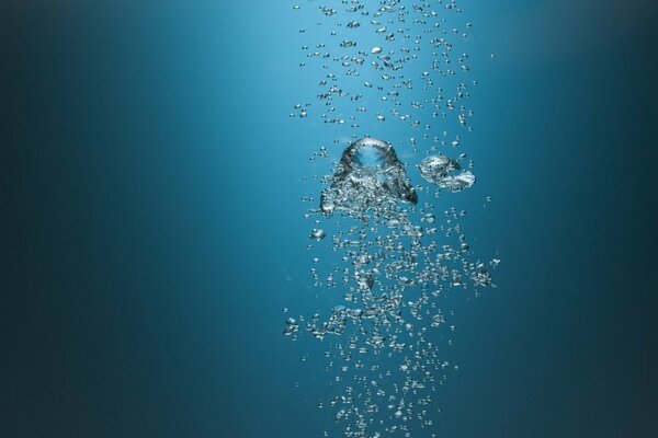 Water bubbles on a blue background