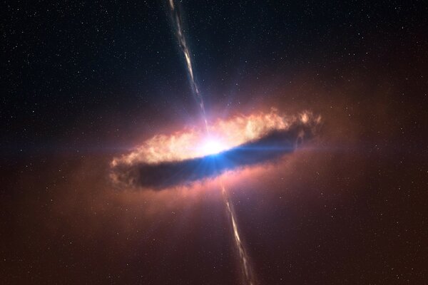 The galaxy explodes brightly in space