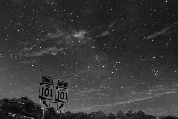 Black and white signs. Starry sky