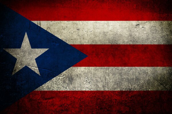 The flag of Puerto Rico is red white and blue