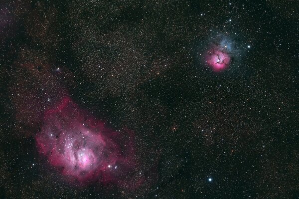 Two nebulae in the vastness of space