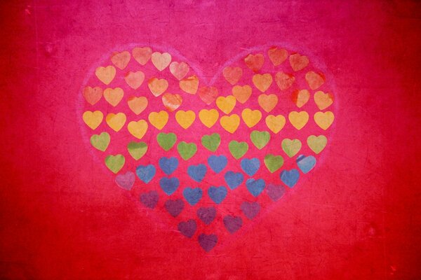 A heart of multicolored hearts on a red background