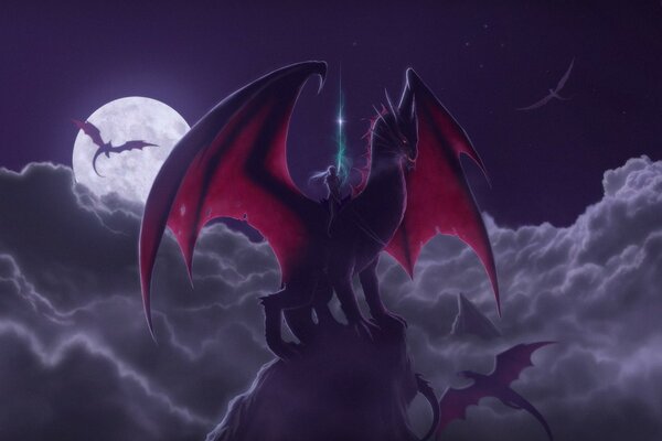 Fantaisie. Il fait nuit. Lune. Cavalier chevauchant le dragon