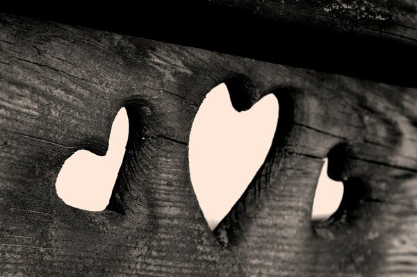 Carved hearts on a wooden board