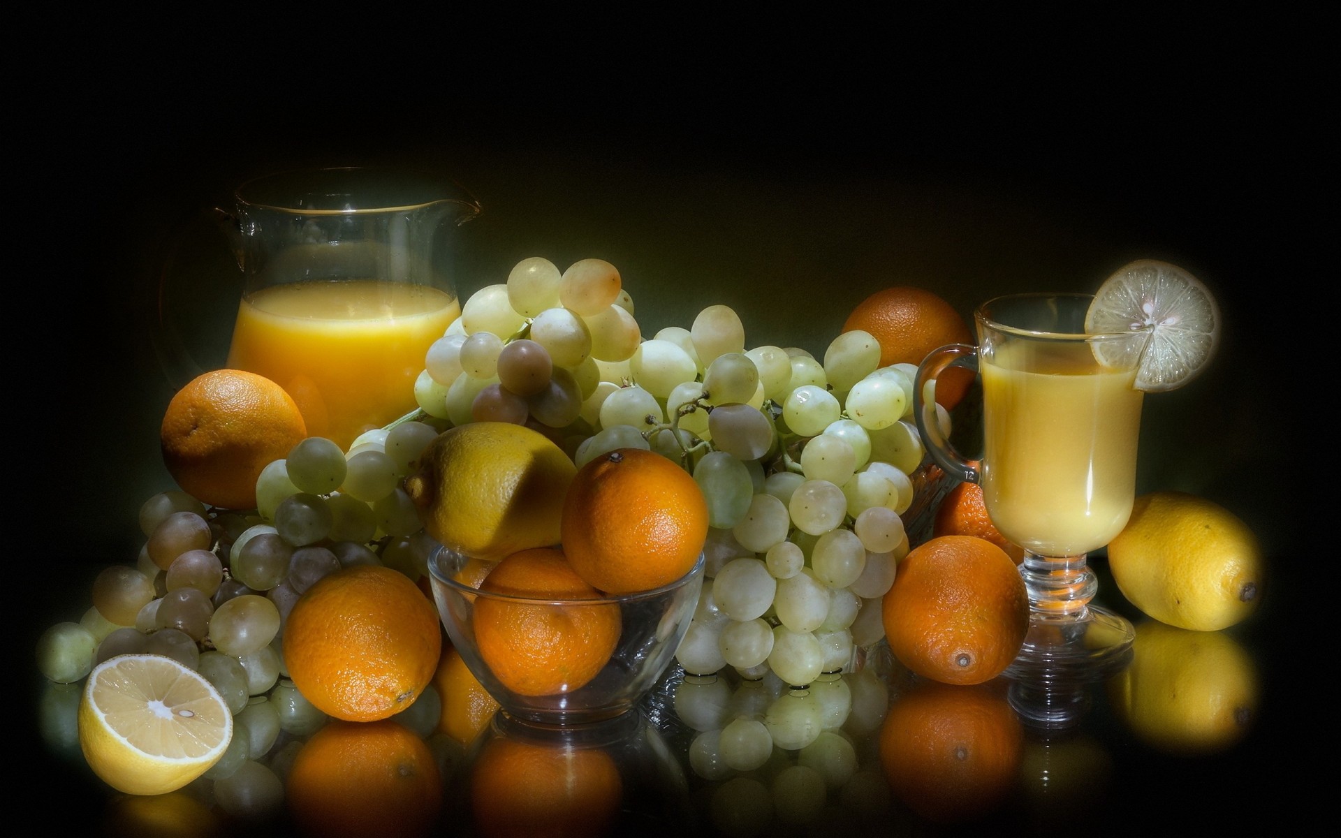 fondo negro fruta jugo comida naranja uvas limón