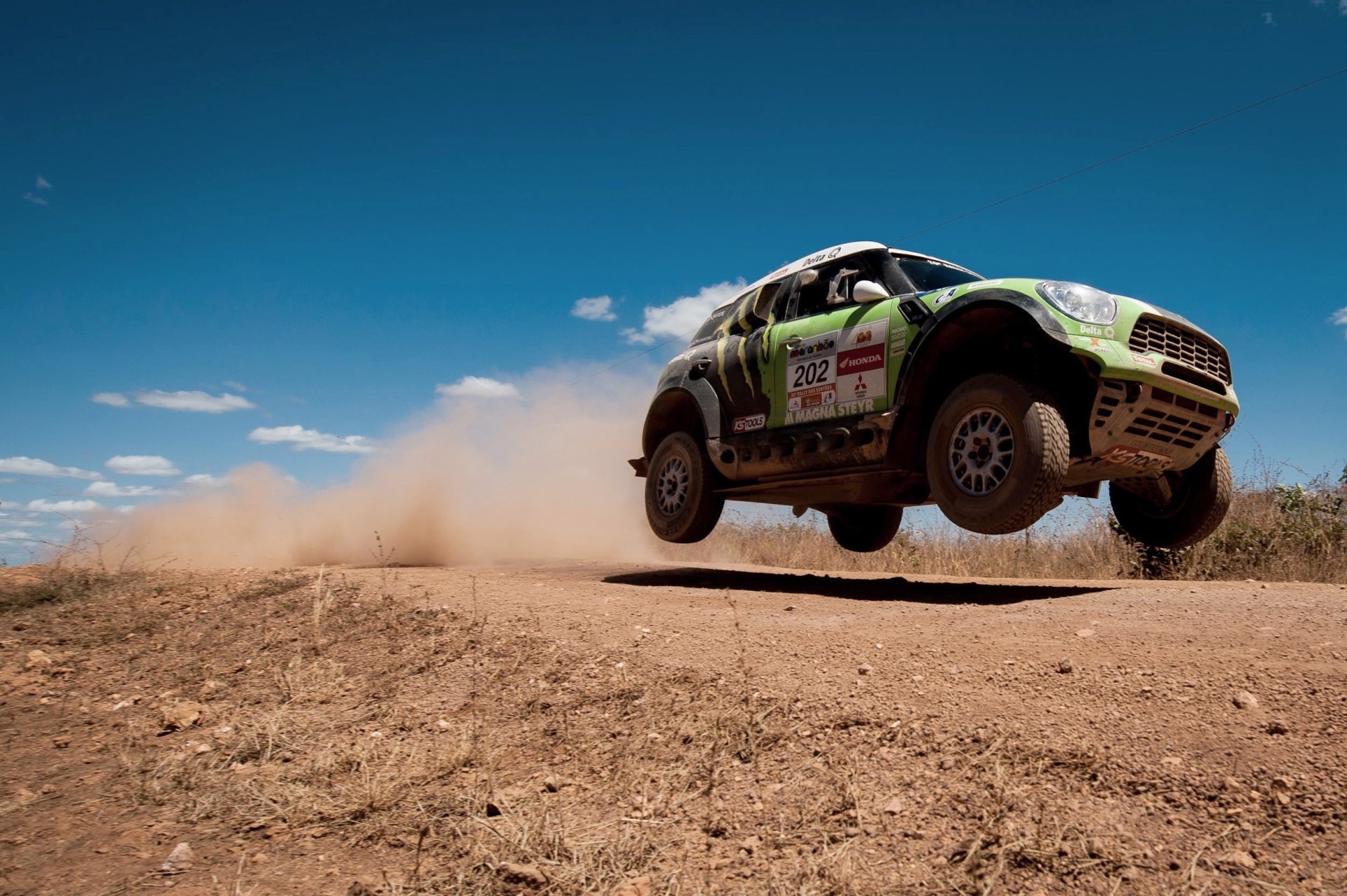 mini cooper mini mini cooper dakar x-raid rally speed flying in the air sky