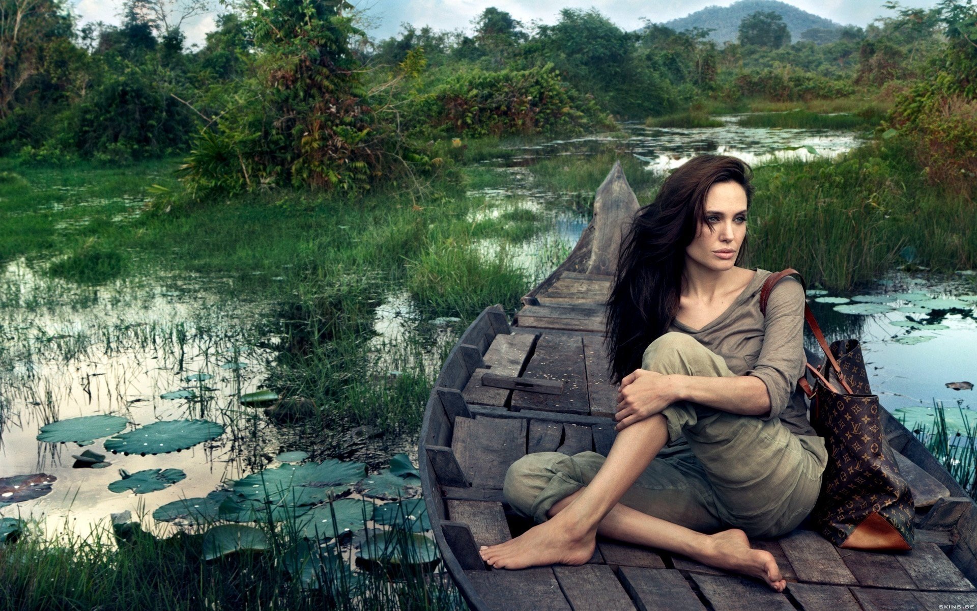 angelina jolie angelina jolie swamps boat sitting actress angelina jolie bag water