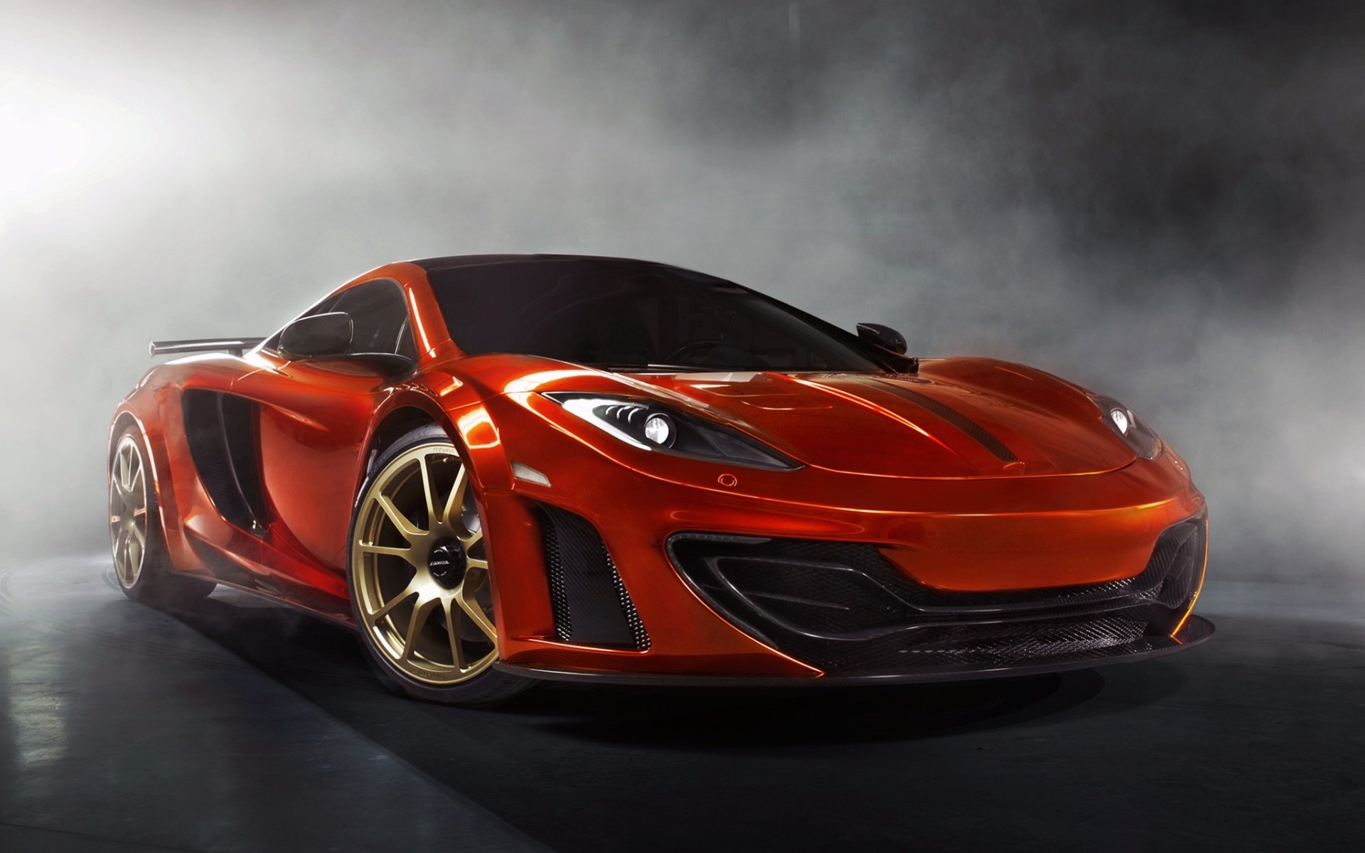 mansory mclaren mp4-12c mclaren supercar arancione messa a punto anteriore fumo sfondo