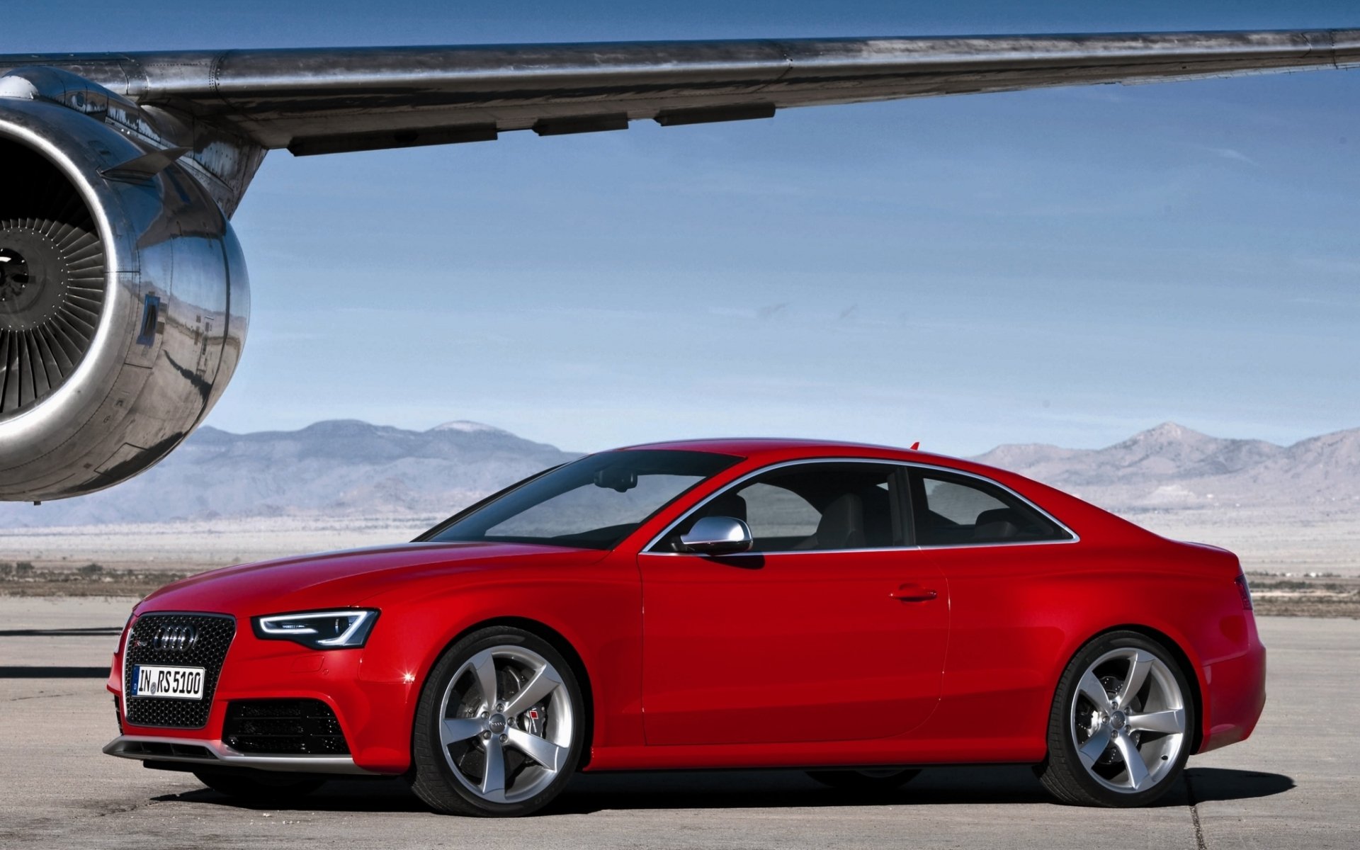 audi rs5 coupe audi rs5 prasny.front end airplane wing turbine mountains sky