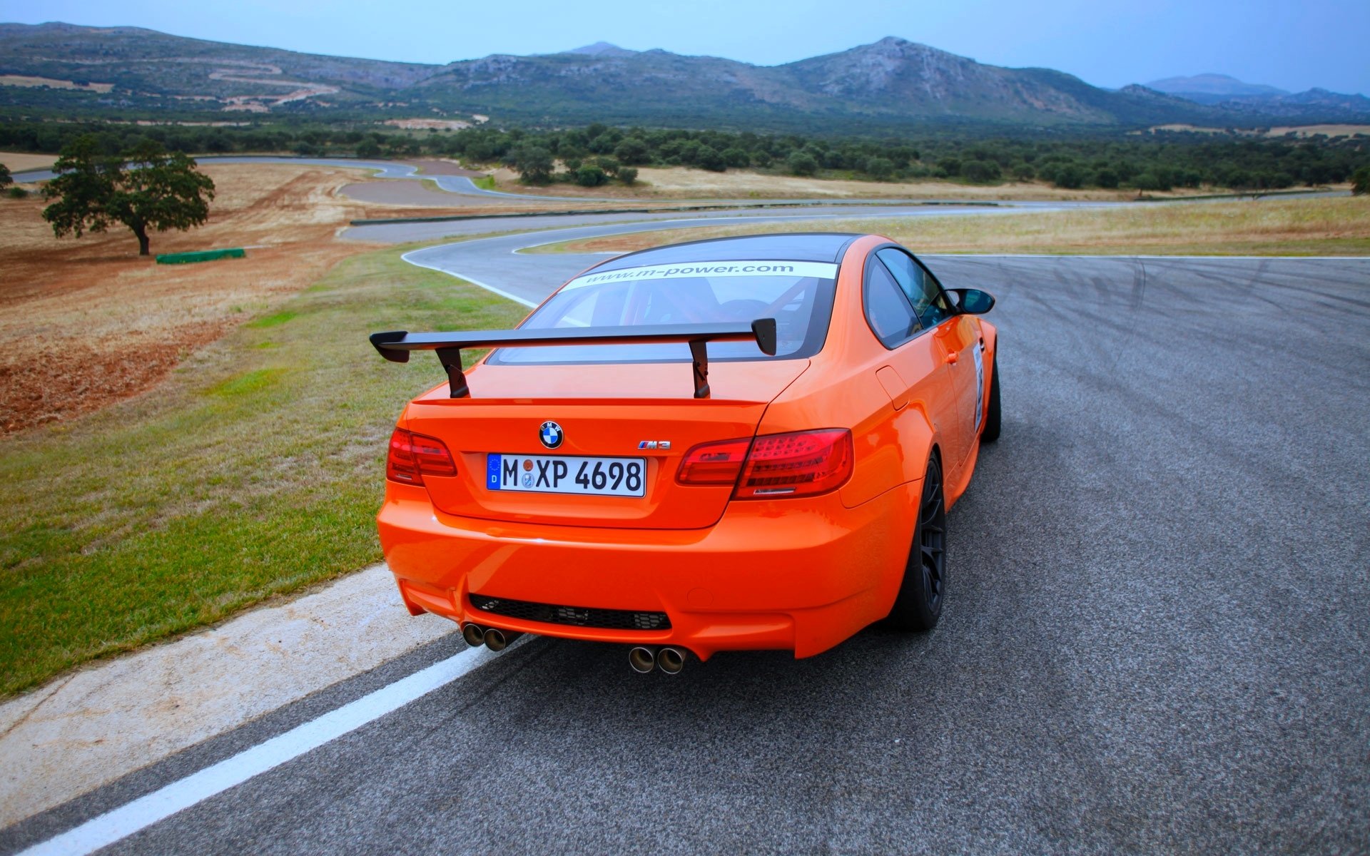 bmw m3 gts bmw orange car turn road traffic spoiler number