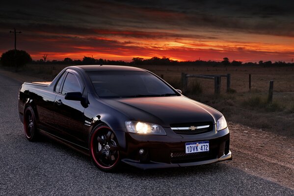 Chevrolet pickup truck on the background of the evening sky