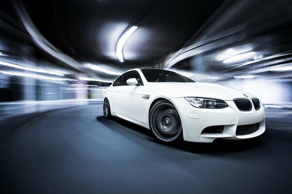 Auto wallpaper with white BMW m3 in motion with special effects