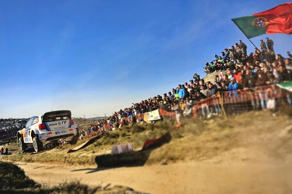 White Volkswagen car racing in Portugal