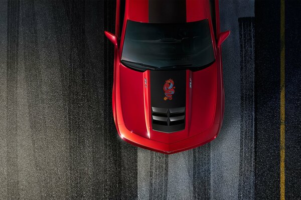 Red Chevrolet Camaro photographed from above