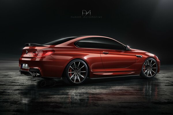 Bmw M6 rojo sobre un fondo neutro oscuro