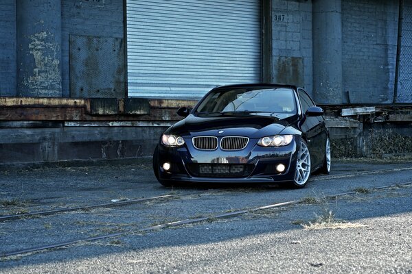 Dark bmw 3 car on the street