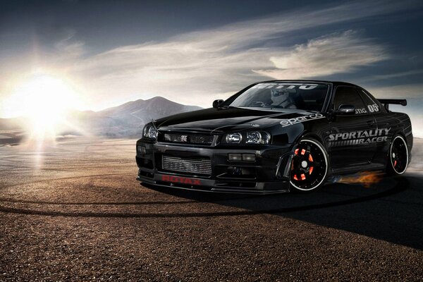 Nissan Skyline negro en el fondo de la puesta de sol