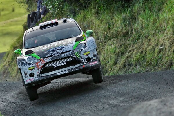 Sports Ford fiesta rides on a dirt road