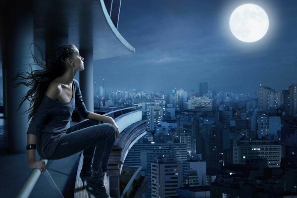 Ragazza sola che guarda la luna