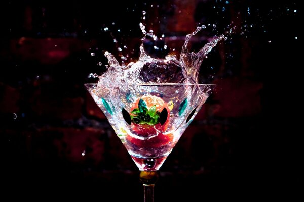 The moment the berries fall into a glass of water