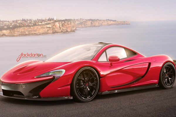 Coche deportivo rojo contra el mar