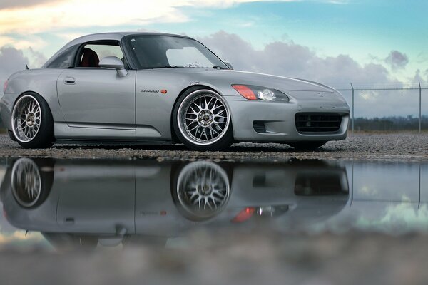 Beautiful honda s2000 stands on dry sand