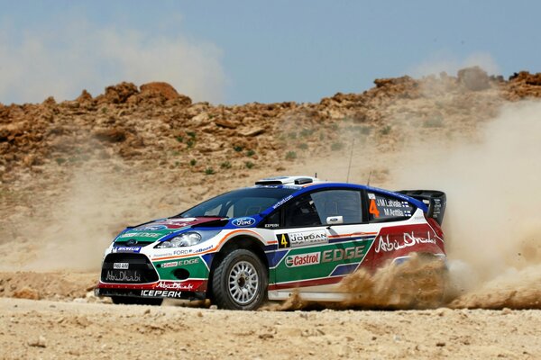 Racing in a desert car at speed