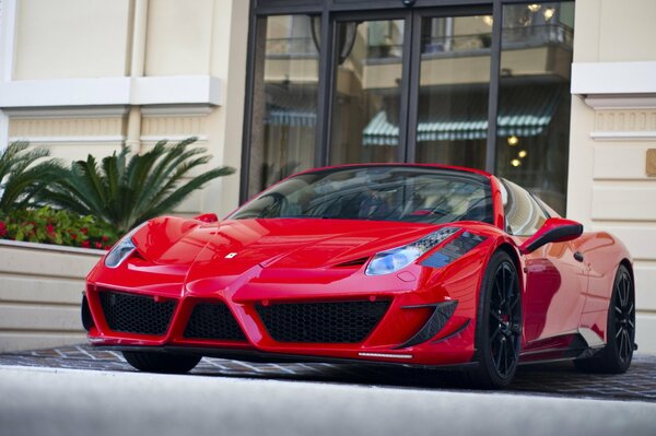 Red Ferrari mansory in Monaco