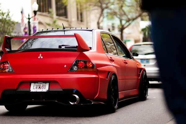 Red matte mitsubishi rear view