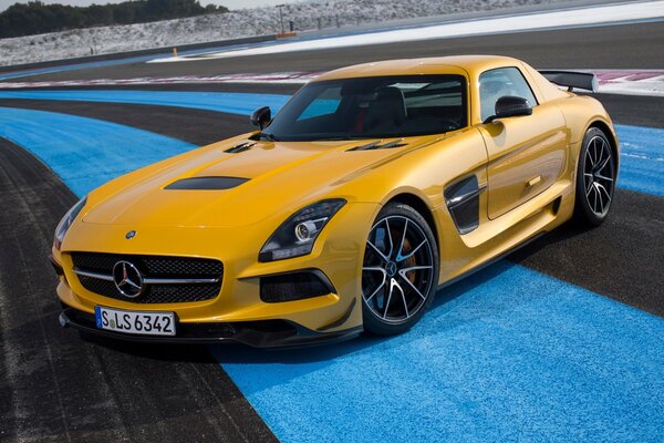 Yellow Mercedes on the race track