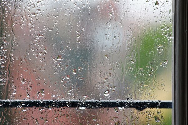 Photo of a window in the rain