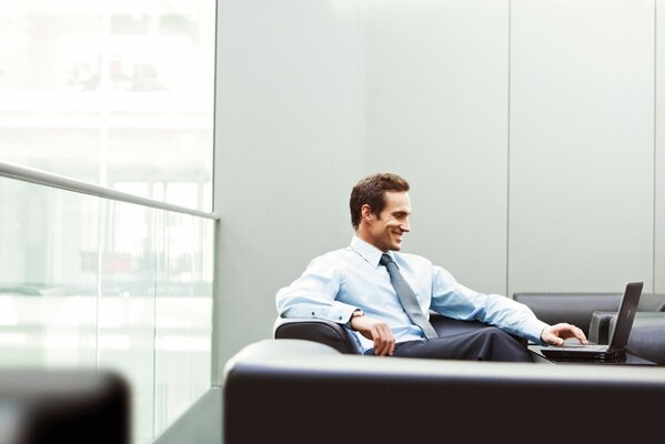 A businessman in his office. Working moment