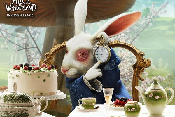 The rabbit from the cartoon Alice in Wonderland sits on the table and points at the clock.