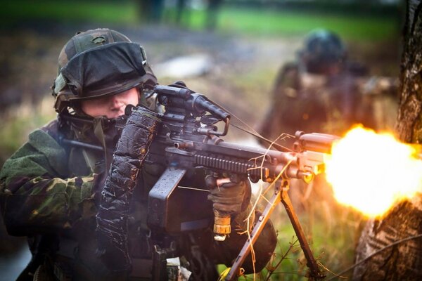 The firepower of a soldier with a machine gun