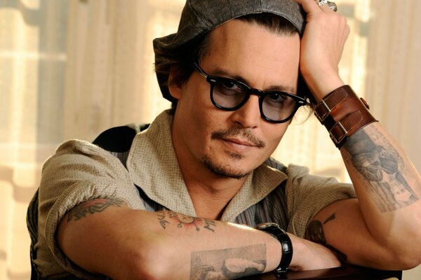 Charming Johnny Depp in glasses
