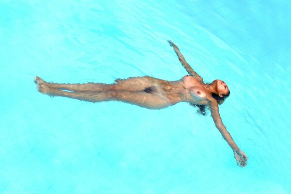 Beautiful sexy girl in the pool