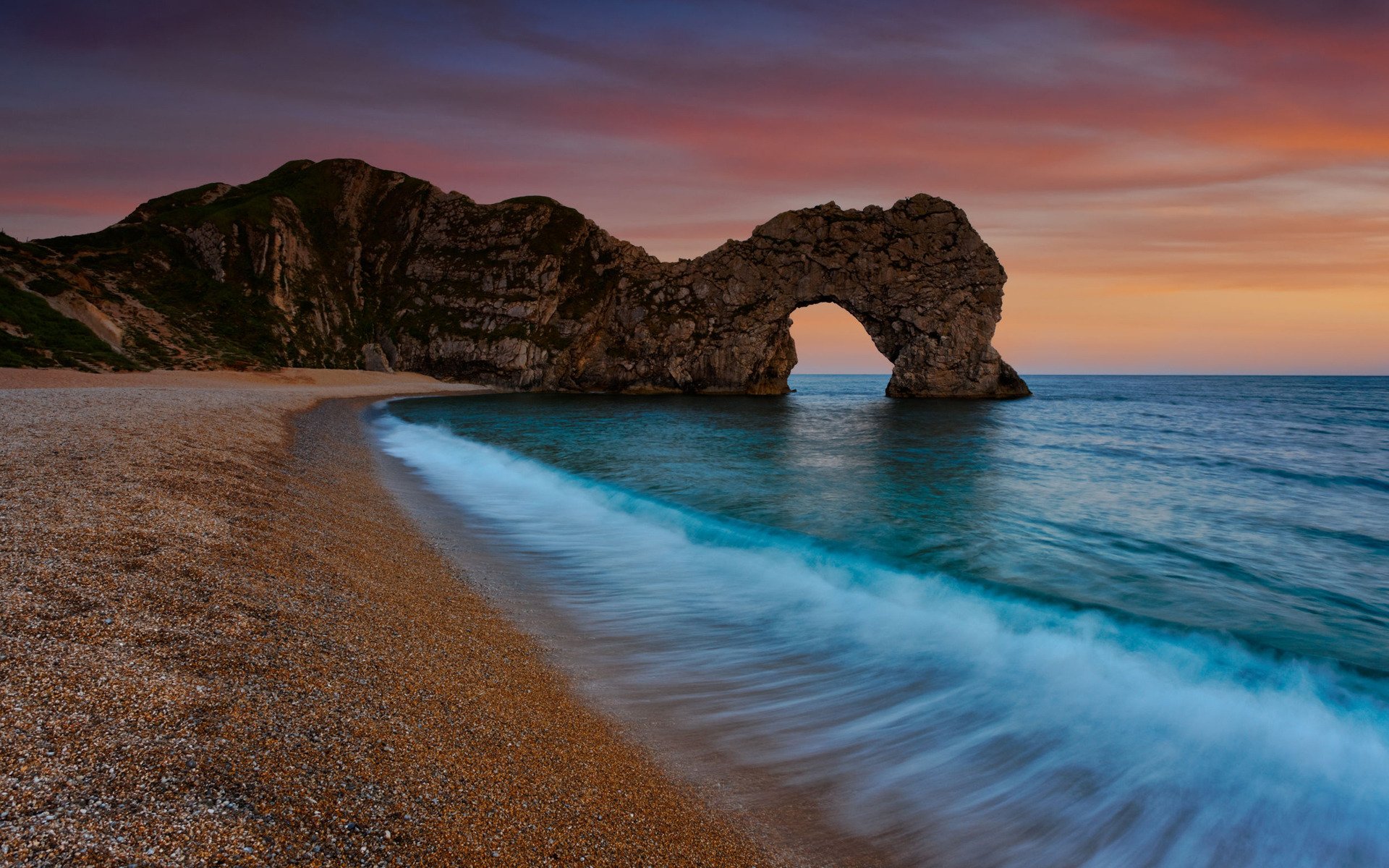 arche arches nature paysage mer eau océan côte côte plages cailloux pierre pierres soir coucher de soleil rocher rochers grottes